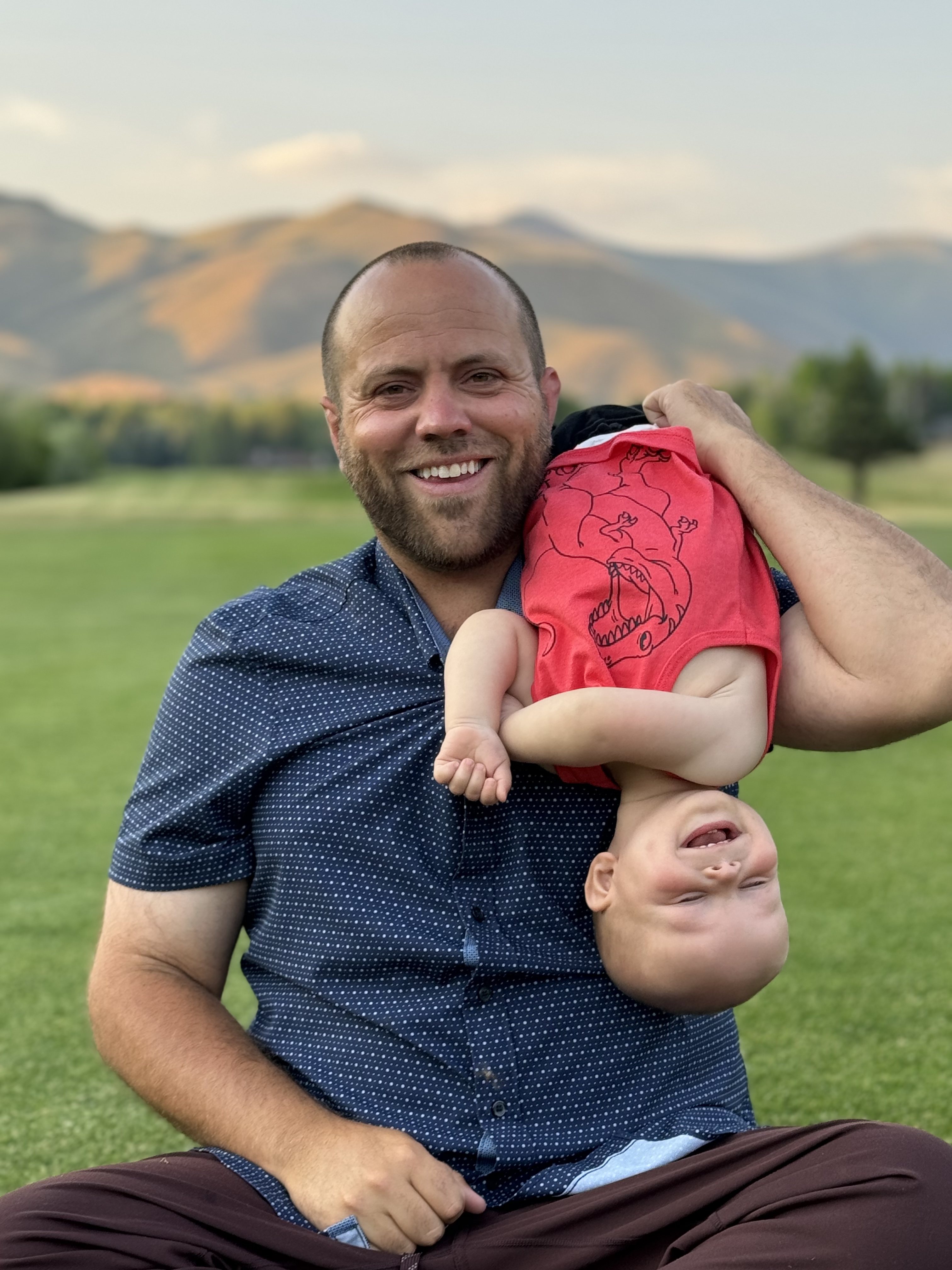A smiling Inspire Wealth Partners client outdoors